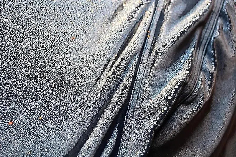 Water droplets on the waterproof fabric of the outdoor car cover